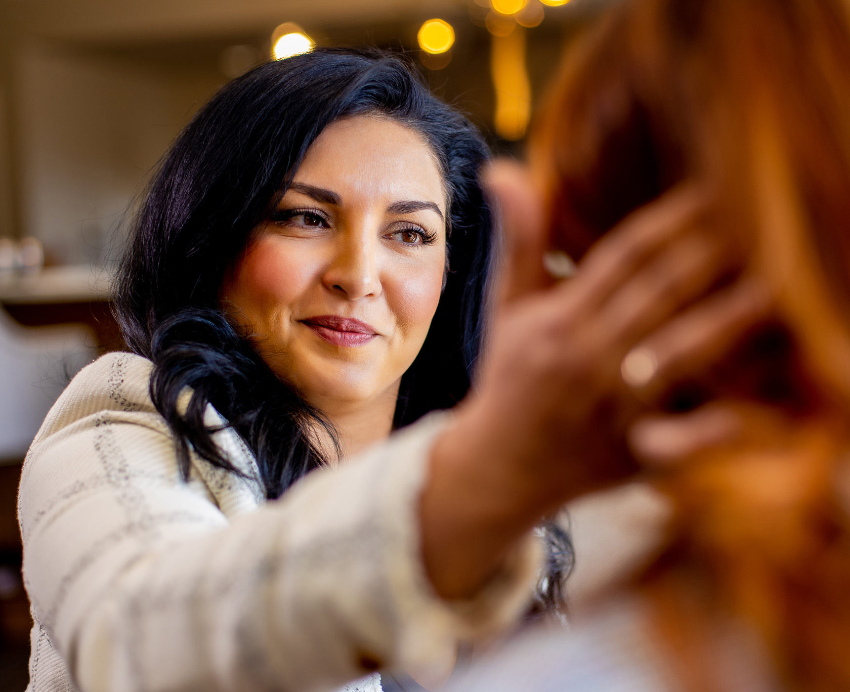Dr. Lily Daniali working with patient